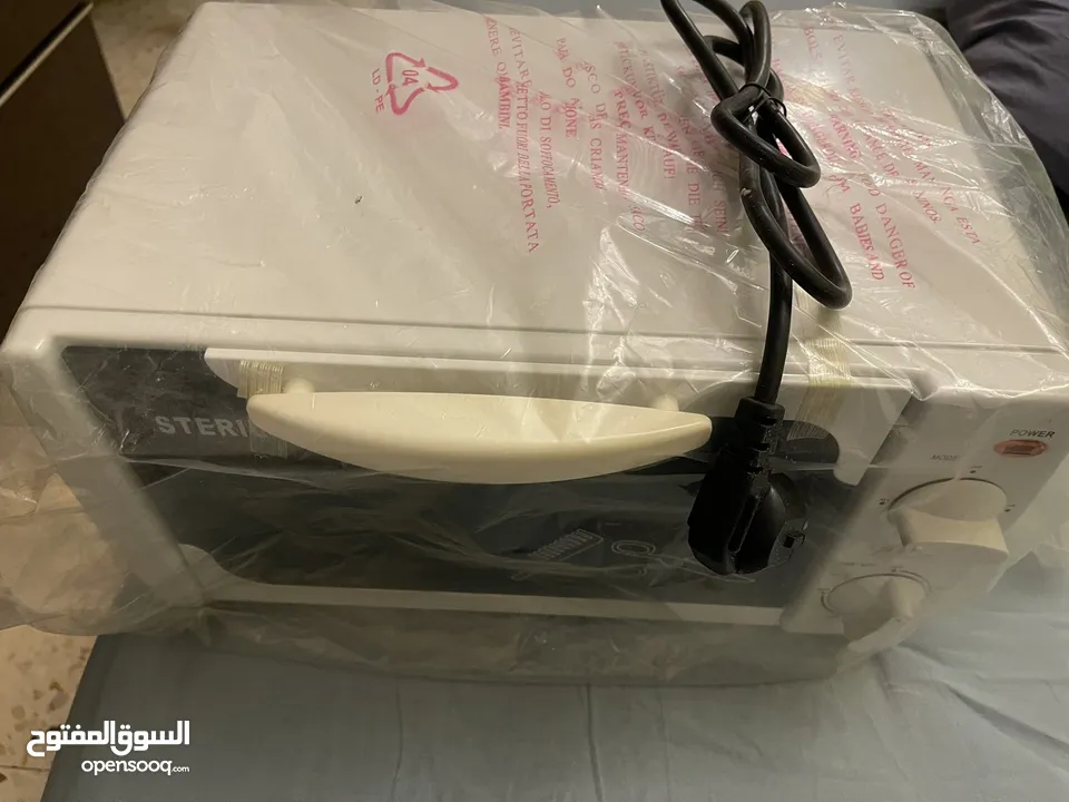 جهاز تعقيم لأدوات الحلاقه مع جهاز واكس