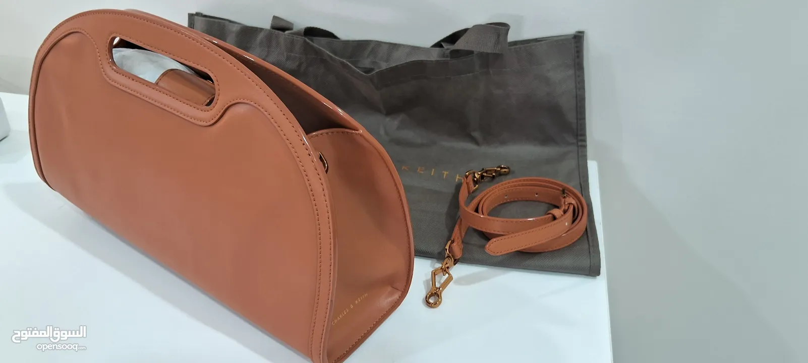 tags on new camel handbag unique with detachable strap