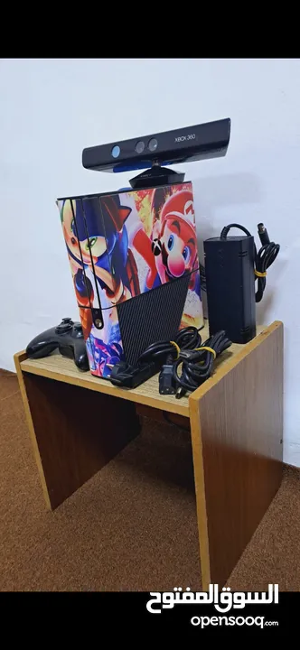 للبيع جهاز العاب xbox 360 معدل Gtag مع كاميرا و سعة تخزين 250 جيغابايت مع مجموعة كبيرة من الالعاب