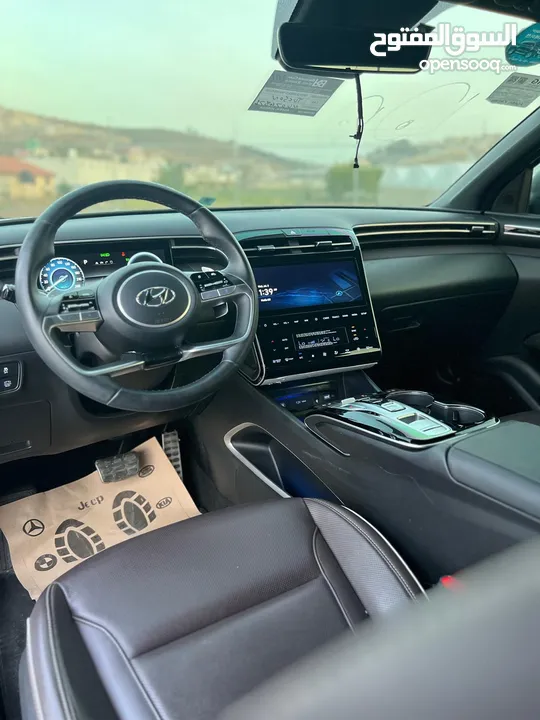 هونداي توسان /2022 فل الفل بدون فتحة سقف  2x4 ///240Hp بنزين + كهرباء  ( Haybrid) 1600cc