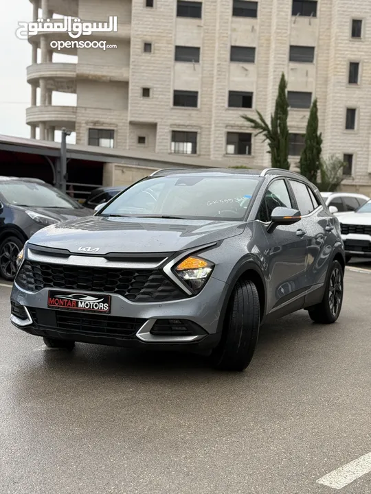 كيا سبورتاج ترخيص 2022 محرك 1600 هايبرد plug in/يقطع على الشحنه 65 كيلو متر