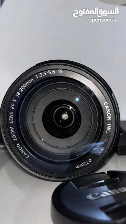 عدسة كانون شاملة Canon EF-S 18-200mm IS مع شاحن وبغطائها - للبيع