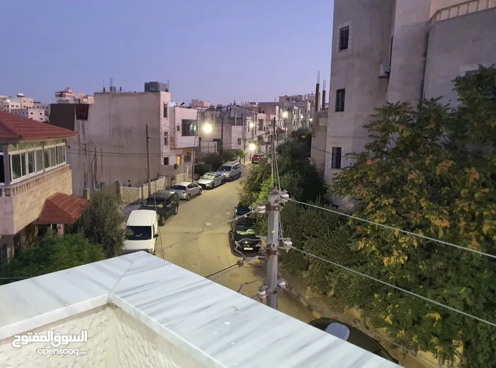 عماره جديده/4 شقق طابقيه للبيع