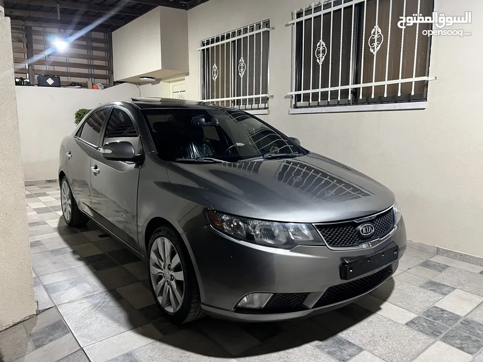 كياااا فورتي 2010 مطور 1600 بنزين جير اتوماتيك فل الفل اضافات سياره بصلاه ع النبي