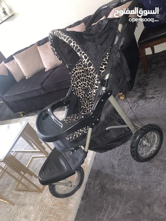 عرباية وكوتة ومقعد سيارة للأطفال