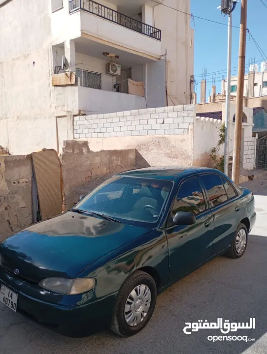 هونداي اكسنت توماتيك اصلي موديل 95 مكيف ثلاجه ترخيص شهر 3/2026 سياره زي ما بالصور واحلى