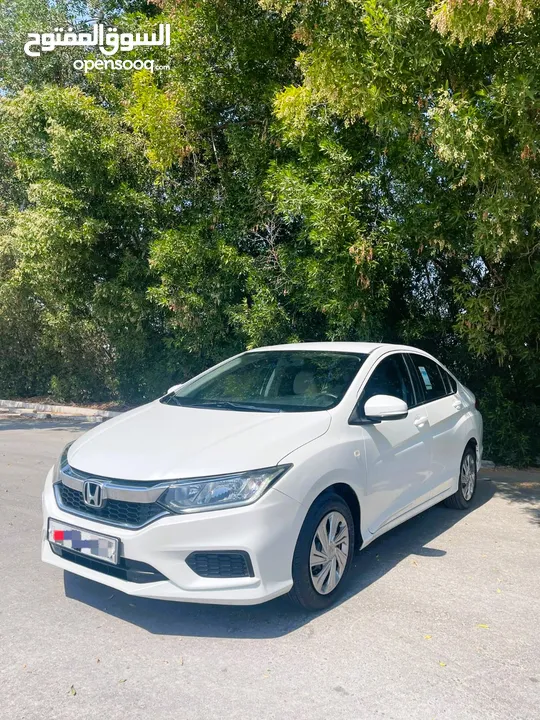 # HONDA CITY ( MODEL - 2019) WHITE COLOR SEDAN CAR 35 66 74 74