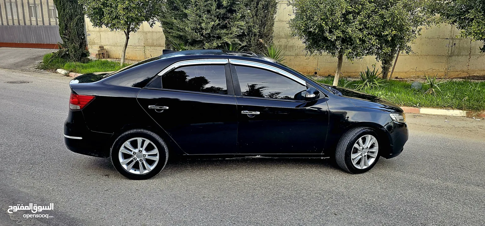 كيا فورتي فل مع فتحه سقف وبصمه 2011 اصل برايفت