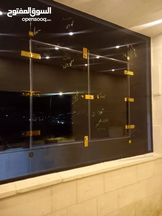 زين للزجاج والمرايا والسيكوريت