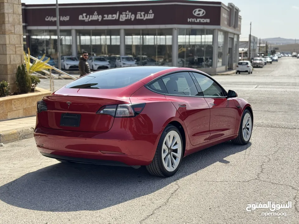 تسلا MODEl مج 3 موديل 2021 ستاندر بلس خمري داخل ابيض بحالة الوكاله فحص كامل حرره