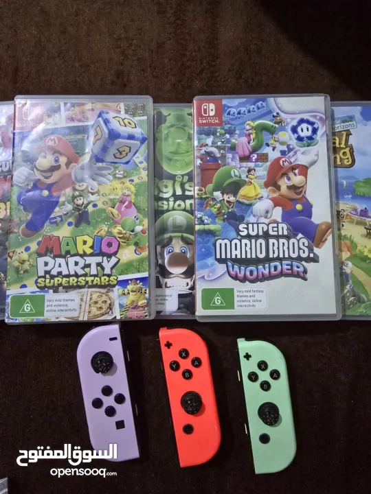 نينتندو سويتش مع 5 العاب super mario party و super mario wonder و super mario 3d world و ايد وكنترول