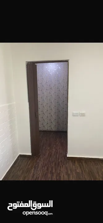شقه طابق ارضي للبيع البنيات خلف جامعة البترا