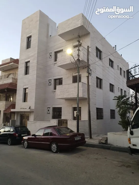 عماره جديده/4 شقق طابقيه للبيع