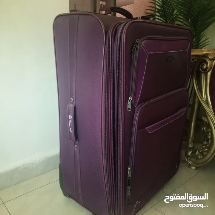 شنتة سفر جر لون بنفسجي غامق حجم كبير