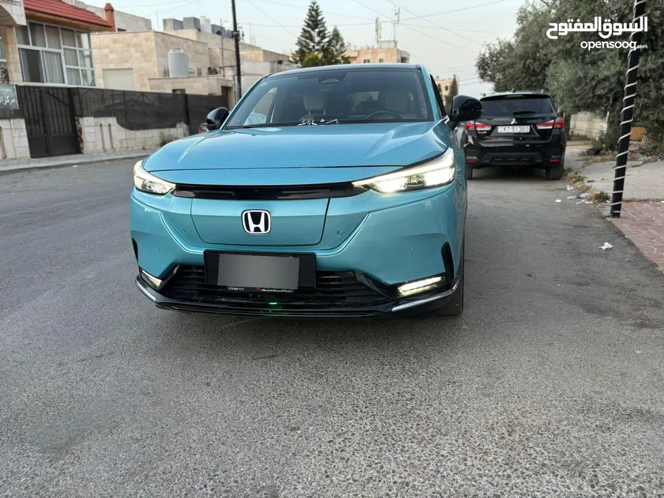 سياره هوندا  اس ون موديل 2023 اعلى مواصفات اللزن تركواز فل كهرباء بتمشي 450كيلو ىالشحنه نظيفه عالشرط