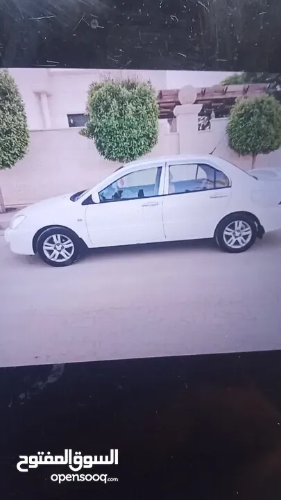 ميتسوبيشي لانسر للبيع بحاله ممتازه