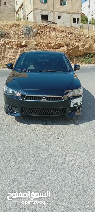 متسوبيشي لانسر فراشة موديل 2015 فحص مرفق مع الصور بحالة الوكاااااالة  ماشية 49 الف km  أصلي