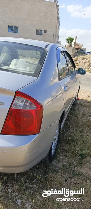 كياا سيراتو للبيع 2004 gold kia cerato 2004 gold