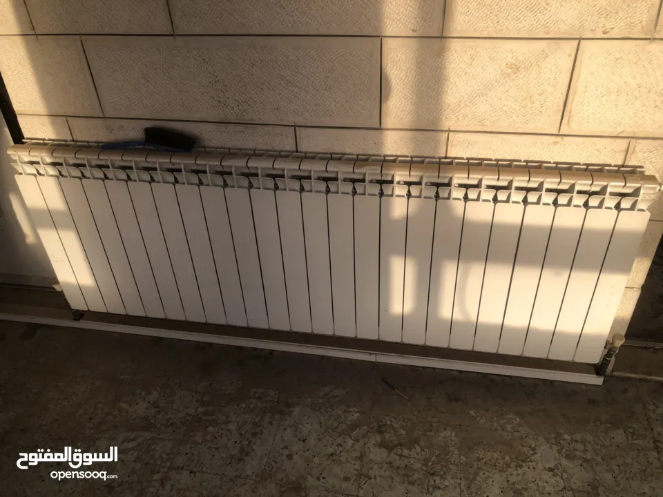 ماطور تدفئة مركزية مع خزان سولار مع الراديترات (المشعاعات)