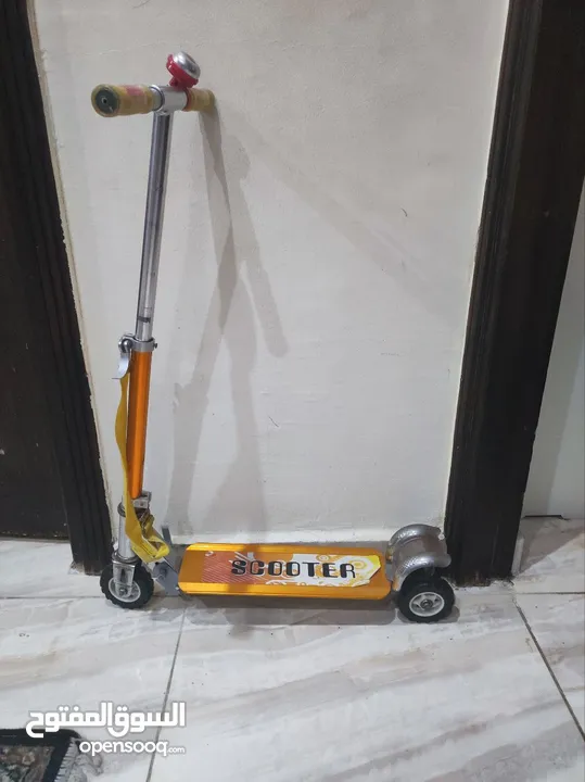 العاب اطفال شبه جديده - منزل - قطار - سكوتر - ماكينة تريكو