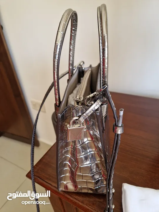Like new Michael Kors crossbody bag metallic colour