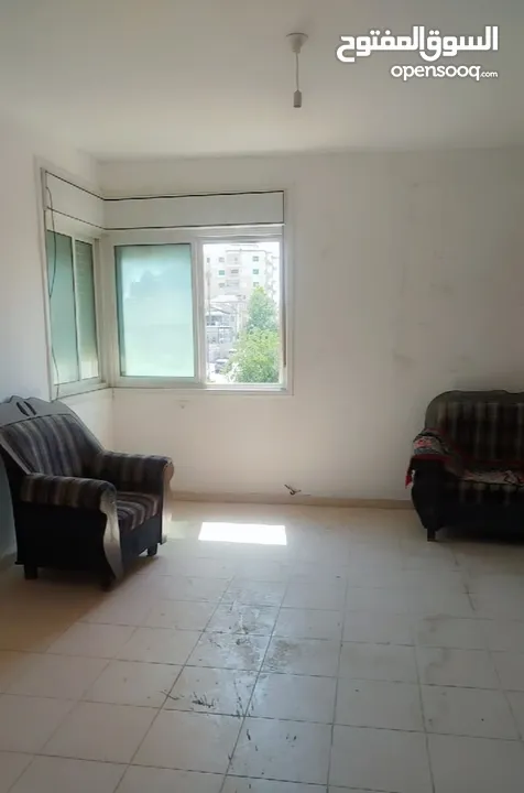 شقه للبيع عمارة اربع طوابق مصعد عمر البناء18سنه مفرق شارع المحكمه وللارسال