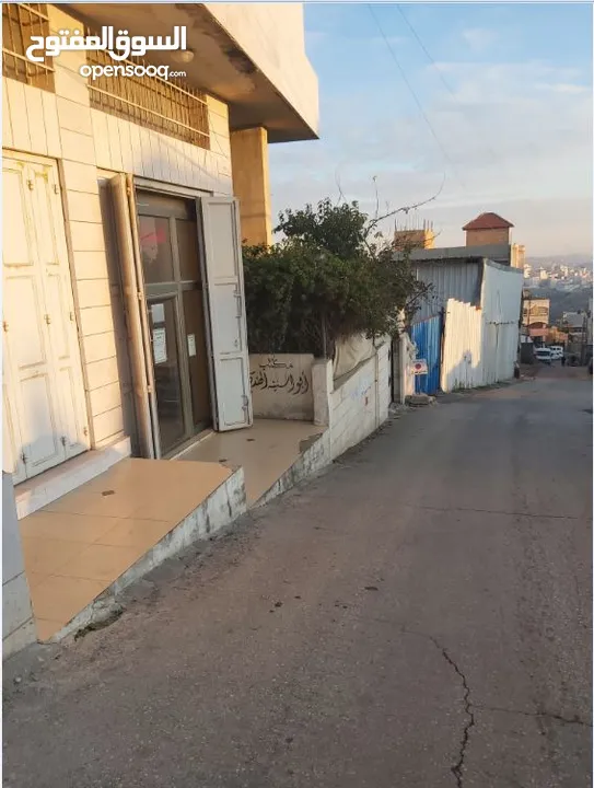 محل مع سدة للبيع