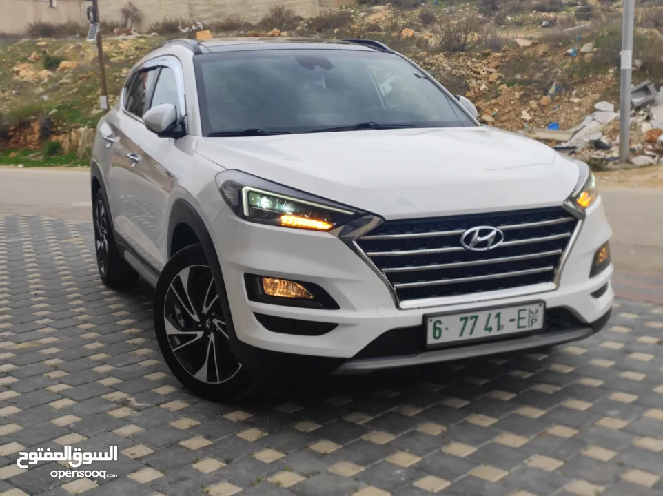 هونداي توسان فل الفل اضافات دهان شركة وعداد أصلي 70000كم فقططط رخصة وتأمين شامل للبيع بسعر مغري