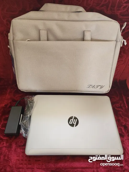 اجهزت hp i7 2.10GHz 500 H.D 8GB Ram  مع شنته جديده وشاحن بطاريه جداد  شاشات لمس