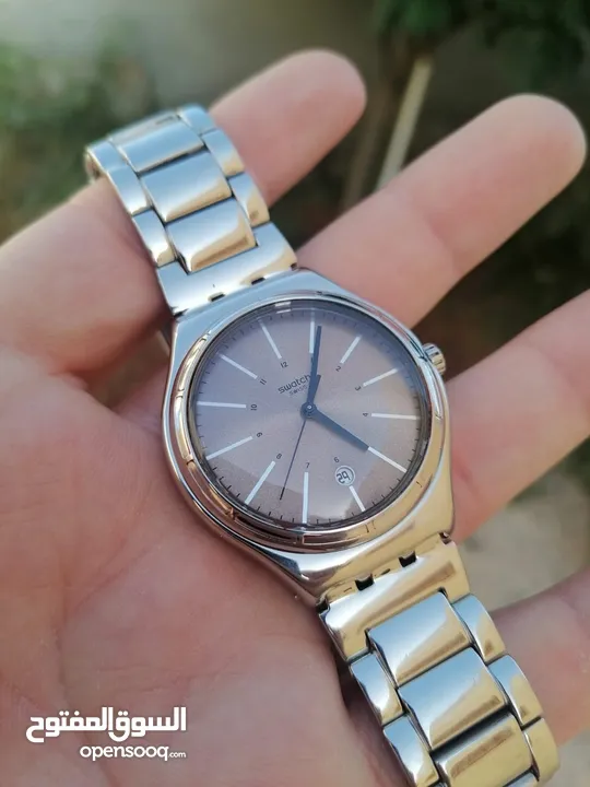 #SWATCH  سواتش سويسري اصلي لومينوس شباك للتاريخ  حجم 41 بحالة ممتازه  40 دينار