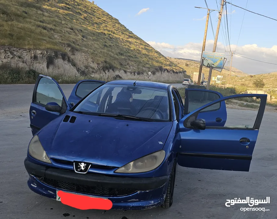 بيجو 206 ..2006 ..جير عادي ..بنزين  ماتور 1400