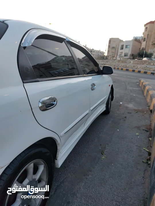كيا سبكيترا للبيع موديل 2002 جير عادي نظيفة وشغل مقناة