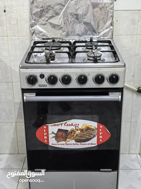 Urgent Sale - Cooking Range 4 burner and Grill