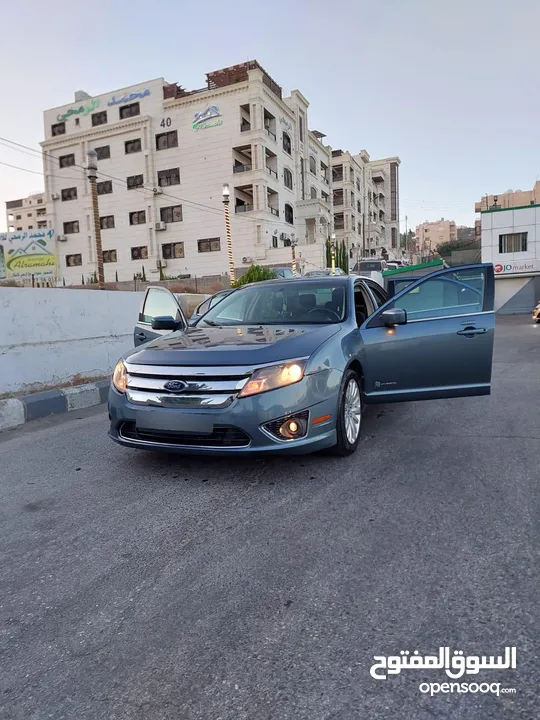 فورد فيوجن 2011 هايبرد استخدام شخصي كلين تايتل 4 جيد  ماتور وجير ونظام الهايبرد بدون اي مشاكل لون بت