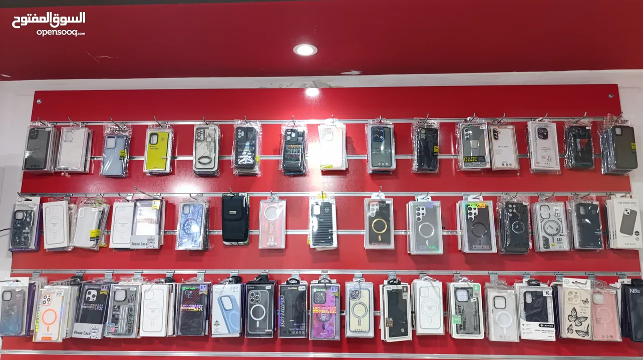 محل كامل للبيع بضاعة رفوف عدت صيانة الجوالات مكيف بترينة