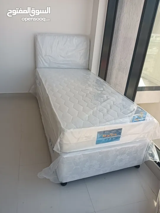 We are selling brand new single American base bed spring mattress