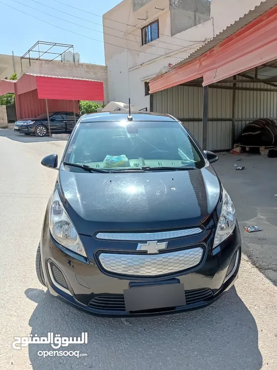 شفروليه سبارك كهرباء كامل2015 كرت ابيض فحص كامل تمشي بشحنه 140كيلو  قابل للتفاوض