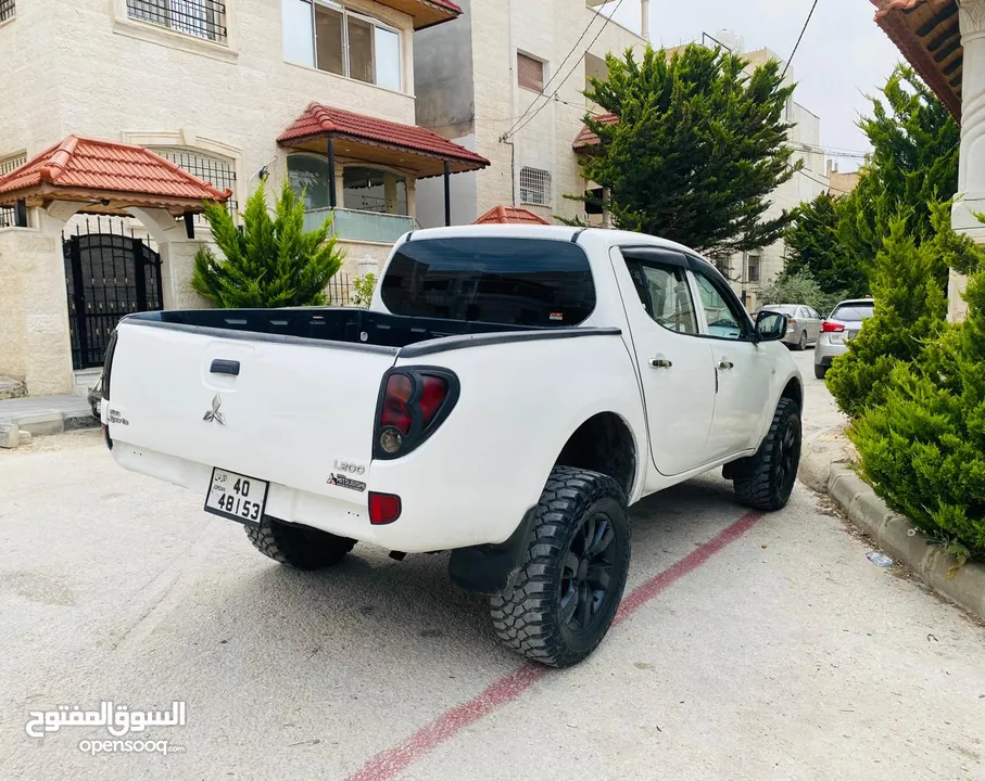 ميتسوبيشي L200 2011 + قطع