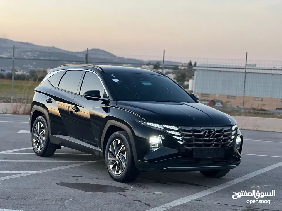 هونداي توسان/2022 فل الفل بدون فتحة سقف  2x4 ///240Hp بنزين + كهرباء  ( Haybrid) 1600cc