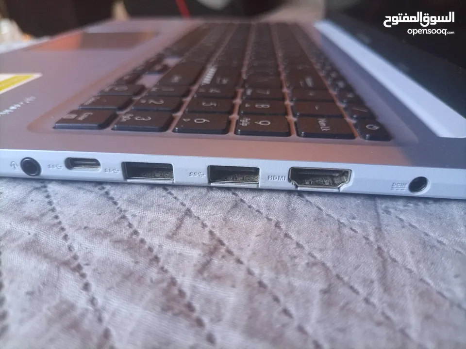 لاب توب مستعمل 5 اشهر ASUS Vivobook شبه جديد مع كرتونتو و شاحنو الأصلي