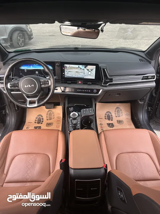 كيا سبورتاج هايبرد 2023 - فل كامل مع بانوراما - غرفة مميزه - عداد قليل اصلي - إمكانية التقسيط.