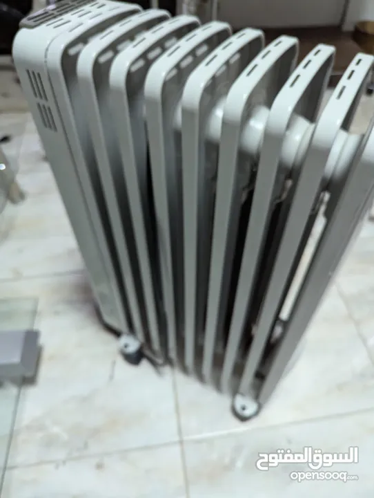 As new barely used electric oil heater تدفئة كهرباء كأنها جديدة