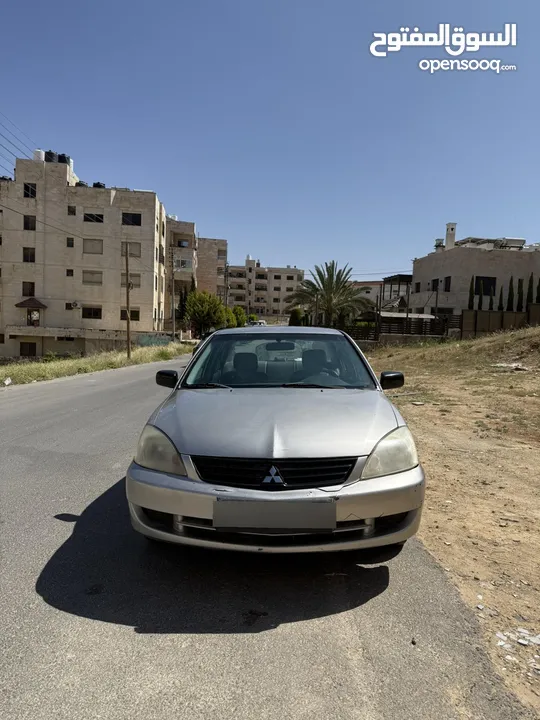 ميتسوبيشي لانسر موديل 2011 للبيع ماتور 1300 4500 دينار قابل للتفاوض