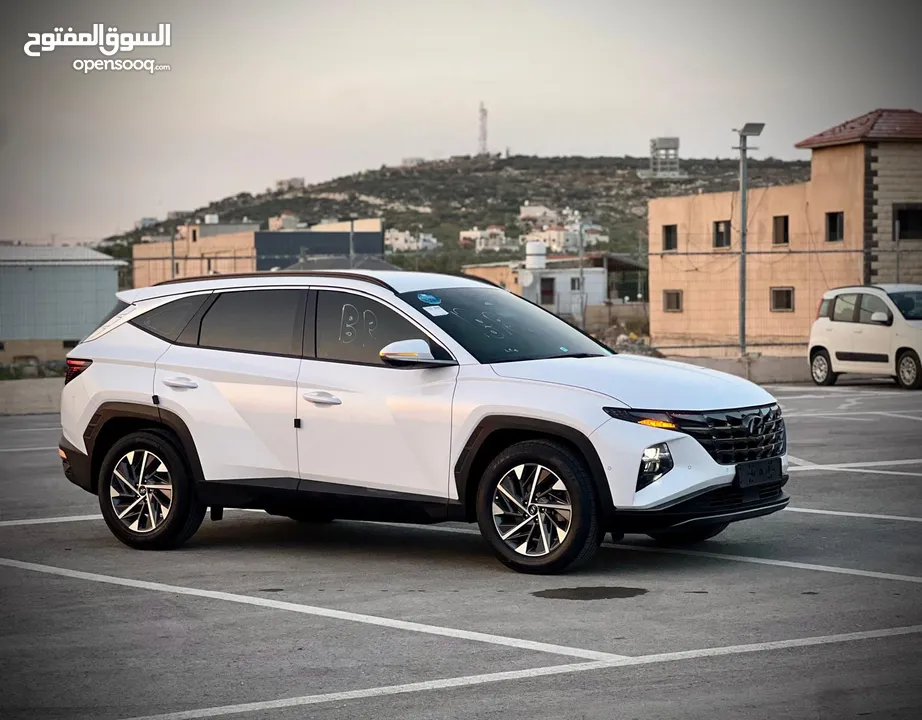 هونداي توسان /2022 فل الفل بدون فتحة سقف  2x4 ///240Hp بنزين + كهرباء  ( Haybrid) 1600cc