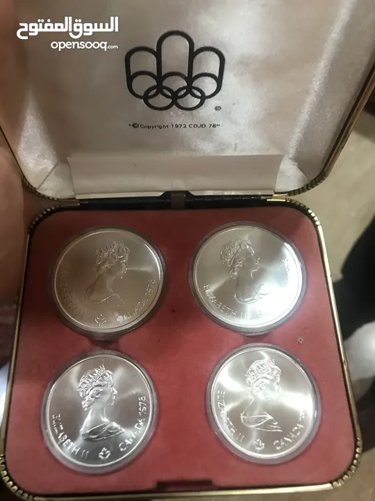 عملة اولومبية كندية عام1976 فضية اربعة عملات مع شهادة