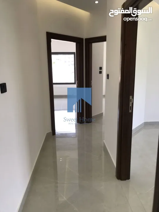 شقة أرضية فاخرة للبيع في الكرسي - خلف إدارة السير 165م مع ترس 30م تشطيب سوبر ديلوكس لم تسكن