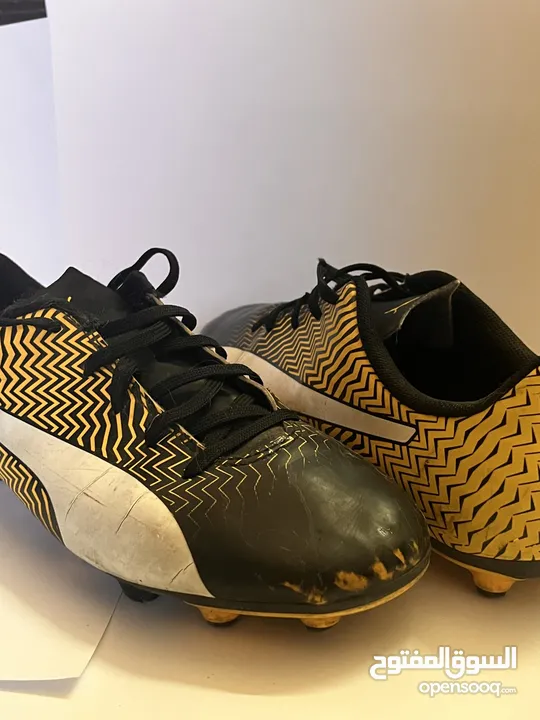 Unisex Puma kids football shoes (yellow) -  حذاء اطفال لون اصفر لكرة القدم (صالح للجنسين)