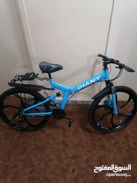 بسكليت جنط 26 لون ازرق قابل للطوي بحاله الوكاله ولا خدش مع الكفاله 1 سنه إقرأ الوصف bike