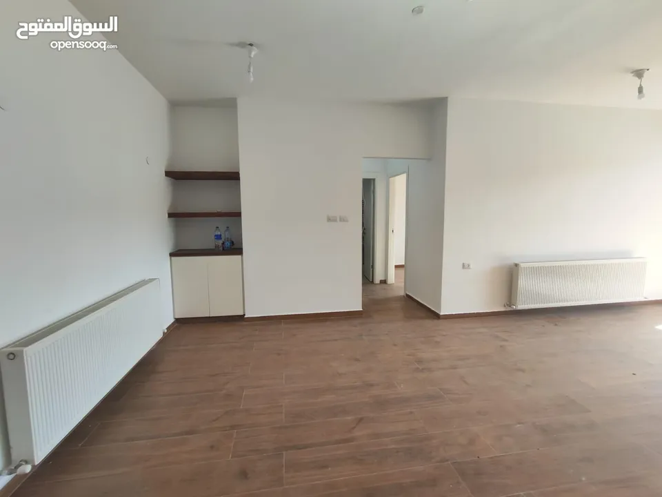 شقة مميزة قيد الفرش للإيجار – عين منجد  شارع إسكان المهندسين