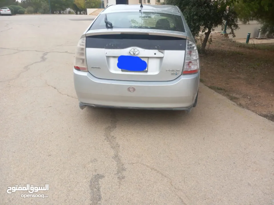 ويوتا بريوس 2007 الفحص مرفق مع الصور بطارية هايبرد جديد الوكاله جير جديد abs جديد بواجي وكوابل جديد
